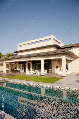 Luxury lap pool and villa © KOTO