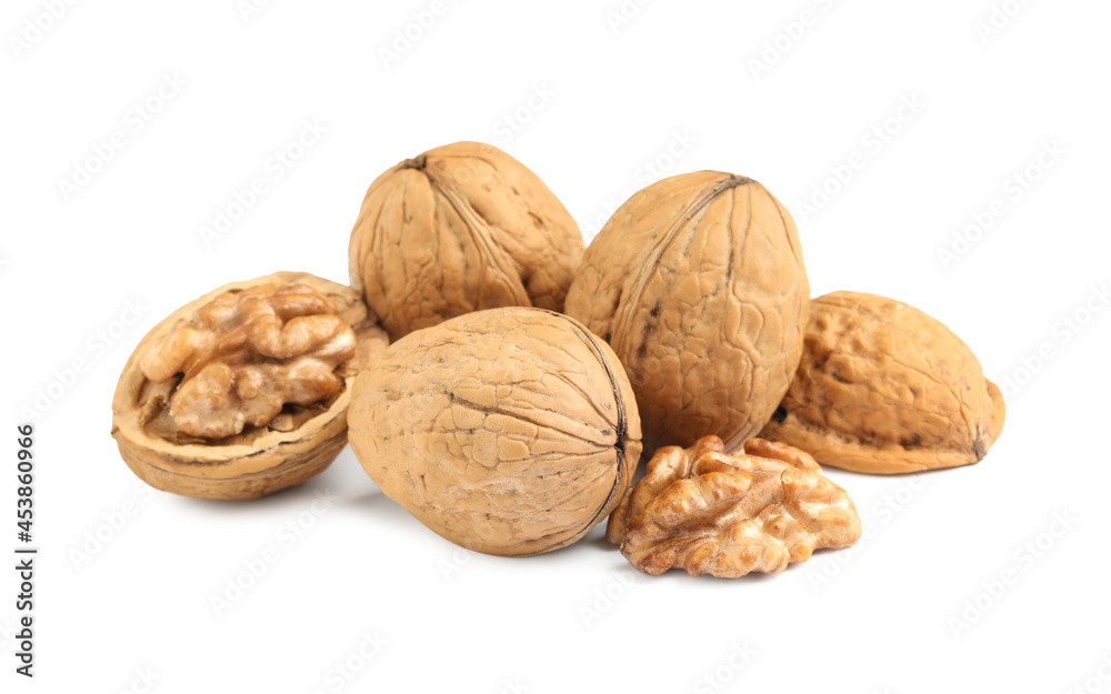 Pile of ripe walnuts on white background Pile of ripe walnuts on white background