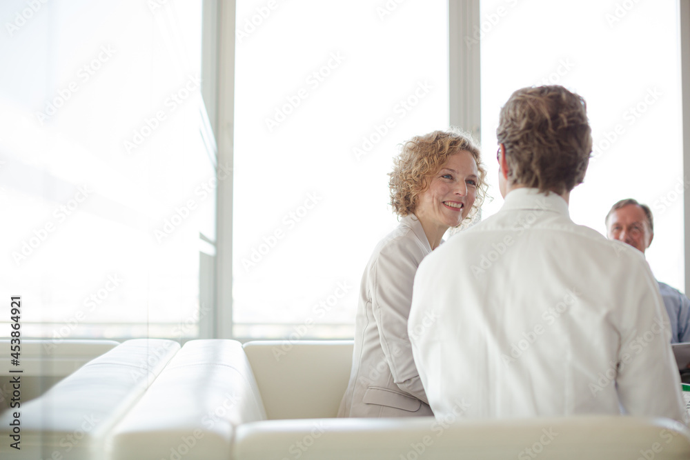 Business people sitting in meeting Business people sitting in meeting