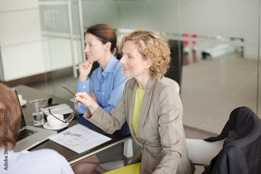 Business people talking in meeting Business people talking in meeting