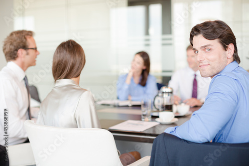 Business people talking in meeting