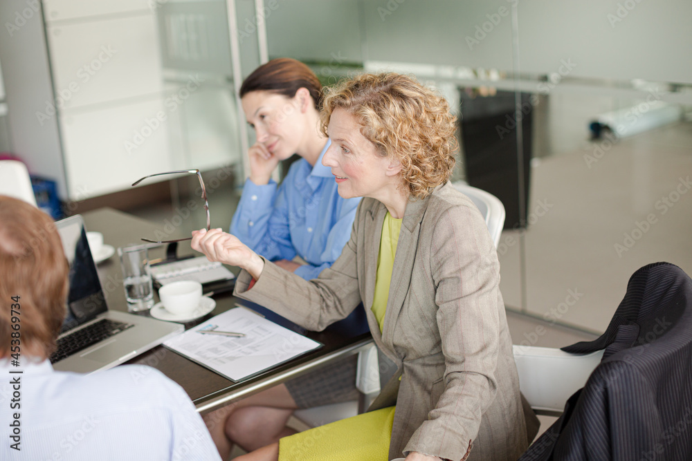 Business people talking in meeting