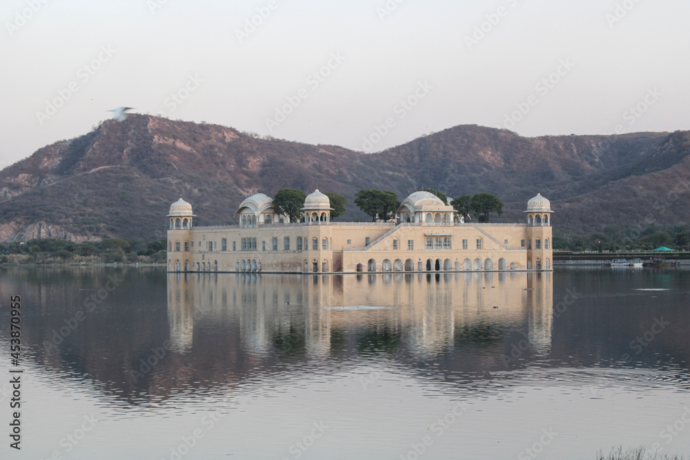 Jal mahal with reflections of mountain