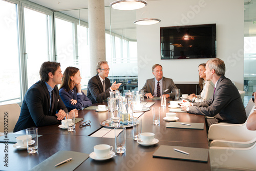 Business people talking in meeting