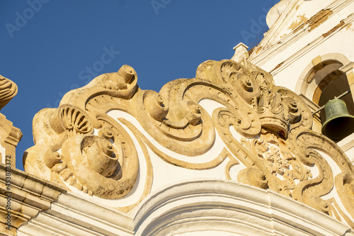 detail of the volutes of the pediment of the Church of Saint Anthony of Lagos, Algarve Portugal photo