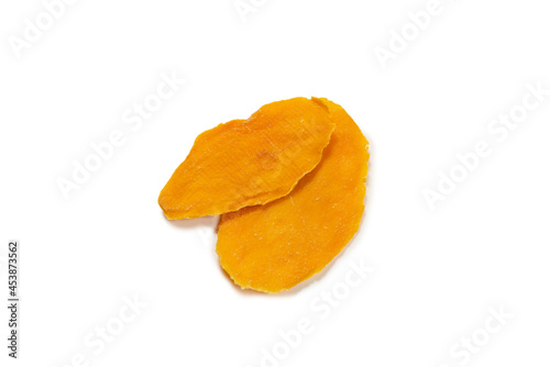 Dry tasty mango slices isolated on a white background.