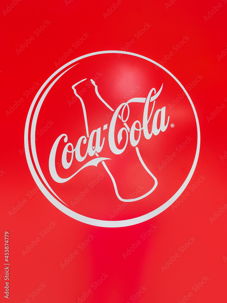Moscow, Russia August 21 2021 CocaCola logo on the red vending