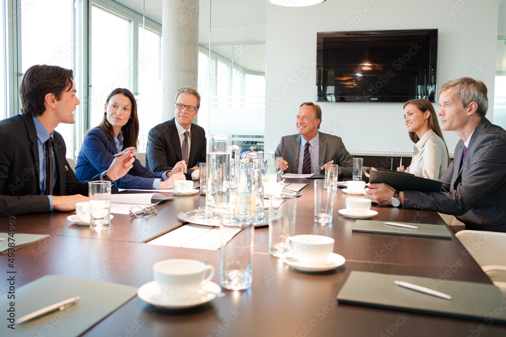 Business people talking in meeting Business people talking in meeting