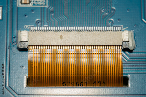 Macro Photo of a Blue PCB with a Ribbon Cable connector
