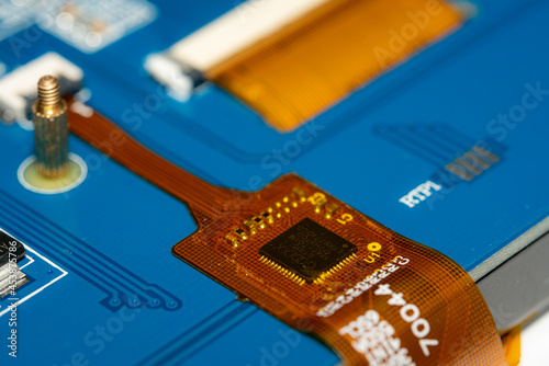 Macro Photo of a Blue PCB with a Ribbon Cable connector