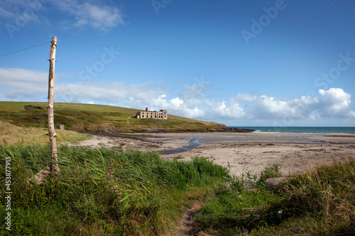 Coolmain Beach. Balleycatten. South west Ireland. Coast and beach. Rivermouth. Old factory. Ruin.