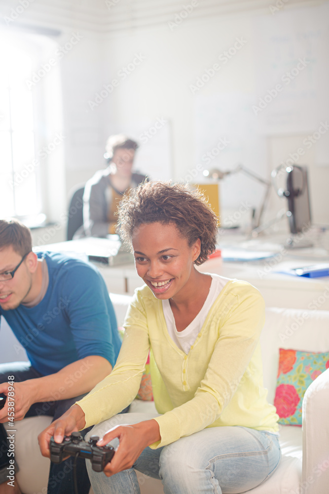 Fototapeta premium Couple playing video games together