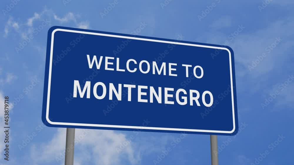 Welcome to Montenegro Republic Road Sign on Clear Blue Sky with Rapid Moving Clouds Welcome to Montenegro Republic Road Sign on Clear Blue Sky with Rapid Moving Clouds