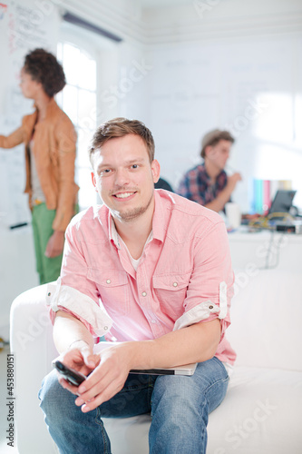 Businessman smiling in office