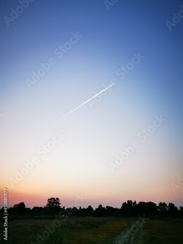 Airplane in the evening sky