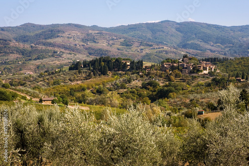 View of the pretty little hill village of Montefioralle and the hills around Greve in Chianti, from the Via di Zano, Tuscany, Italy