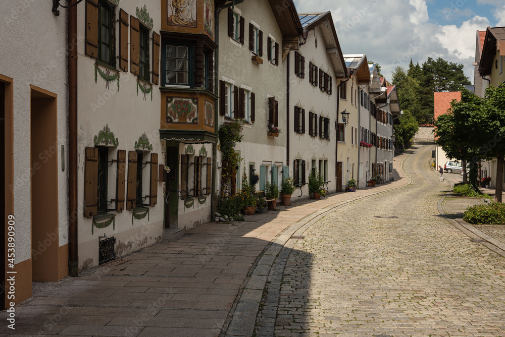 Street with traditional houses in old town of Füssen, Bavaria, Germany