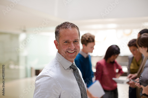 Businessman smiling in meeting