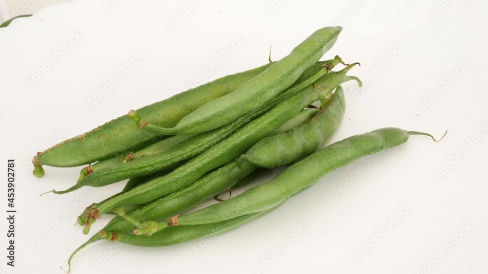 Close view of green beans isolated over white background Close view of green beans isolated over white background