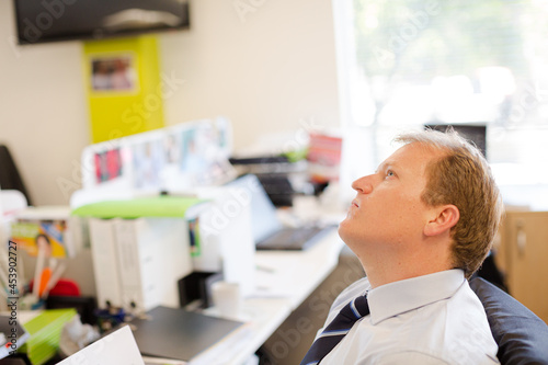 Businessman thinking at desk