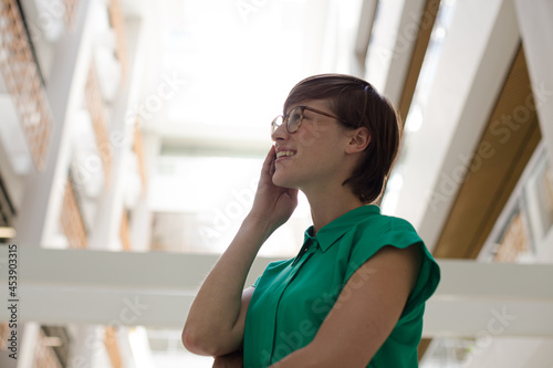 Businesswoman using cell phone outdoors