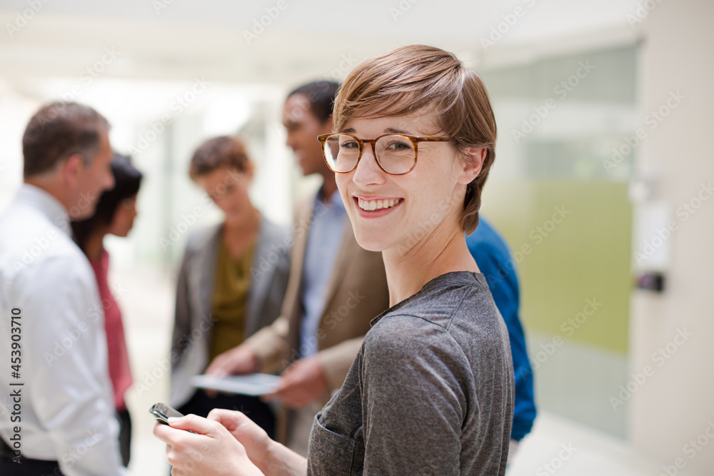 Obraz premium Businesswoman smiling in meeting