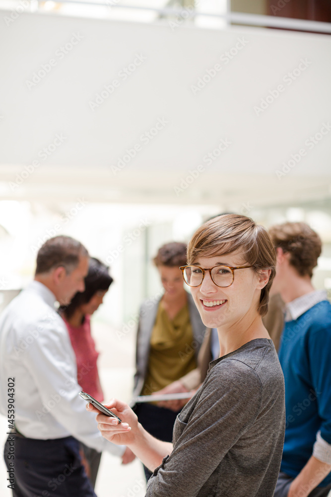 Businesswoman smiling in meeting