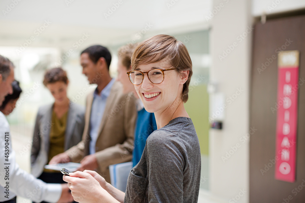 Obraz premium Businesswoman smiling in meeting