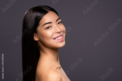 Photo of charming cheerful korean lady white smile tender tempting pose isolated grey color background