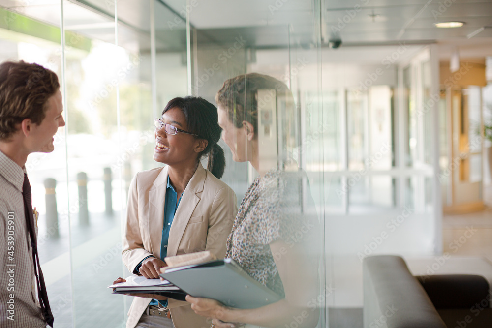 Business people talking in office Business people talking in office