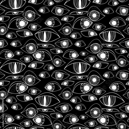 Vector seamless black and white abstract pattern of lined ornamental bright eye shapes photo