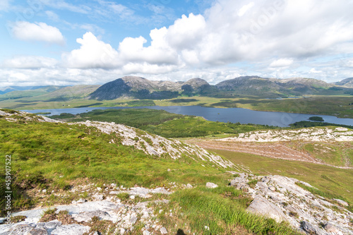 Mountains view over Lough Inagh from top of Derryclare peack. photo