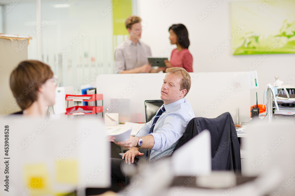 Business people talking in office Business people talking in office