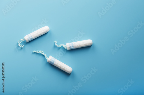 Gynecological tampons on a blue background free space