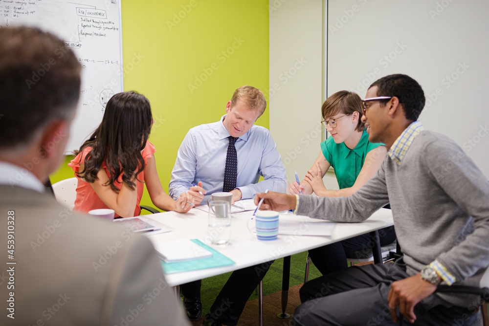 © KOTO - Business people talking in meeting