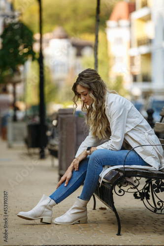 woman sitting on a bench