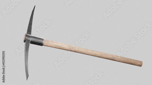 Closeup shot of a pickaxe on the gray background