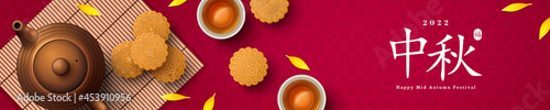 Mooncake on bamboo mat and teacup on red background, Chinese translation is blessing and Mid Autumn. Top view of tea ceremony with cookies, China holiday festival poster design.