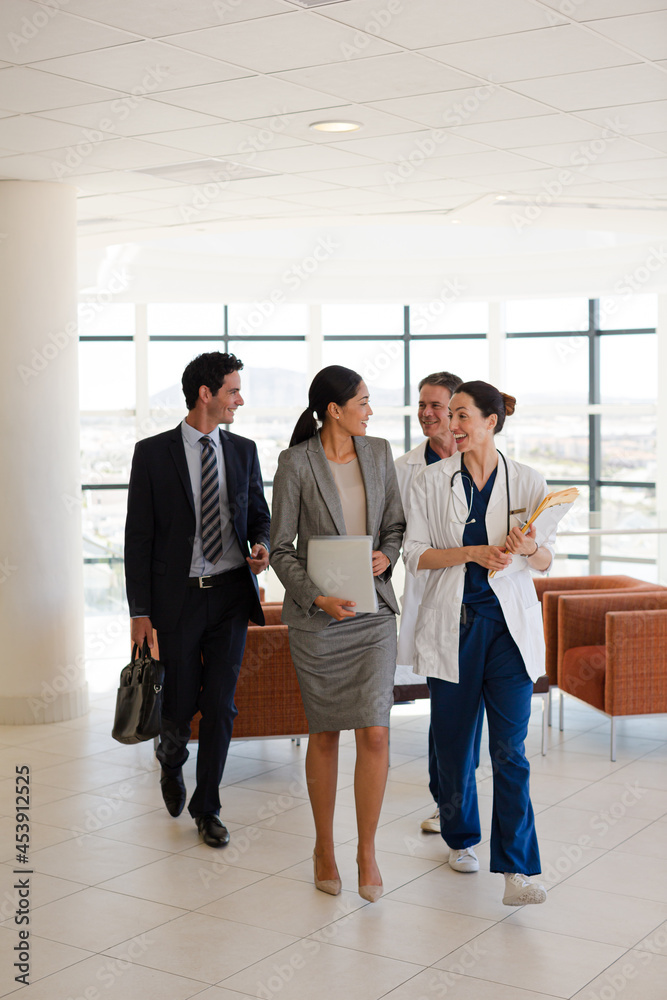 Fototapeta premium Portrait of smiling doctor in meeting