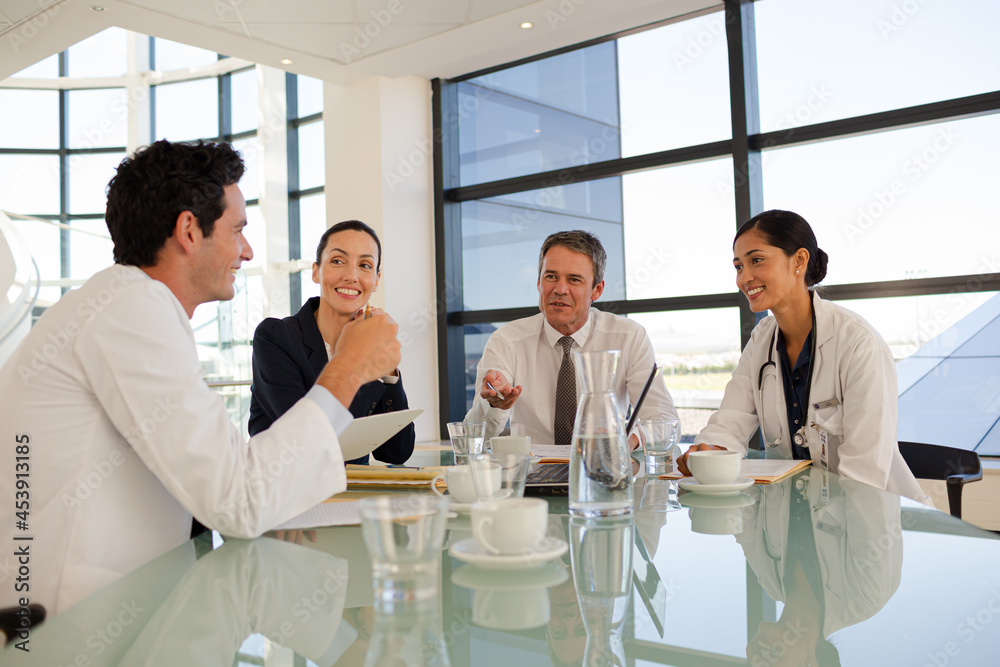 Fototapeta premium Portrait of smiling nurse in hospital corridor