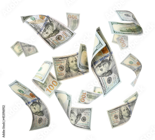 Many American dollars on white background. Flying money