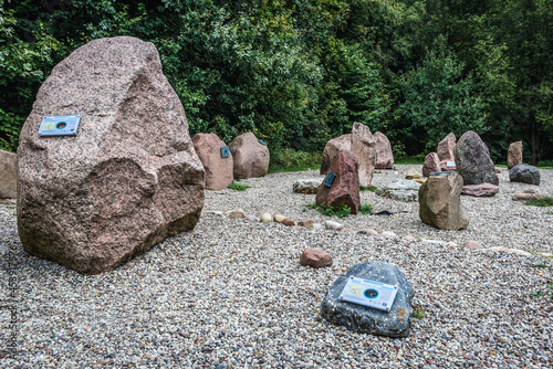 Open air exhibit of stones and rocks in Dylewo Hills Landscape Park, Warmia and Mazury region of Poland photo