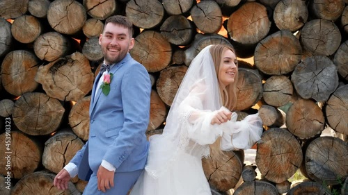 Beautiful bride and groom energetic funny dance with smile. Dancers wedding couple newlyweds. Fun attractive bride. Smiling wedding partners dancing together. Movement dancer joyful couple groom.
