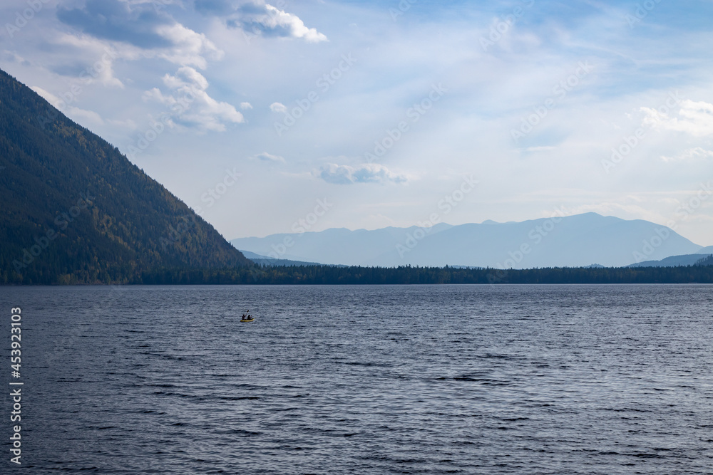 Lake McDonald at Glacier National Park with mountain range background Lake McDonald at Glacier National Park with mountain range background