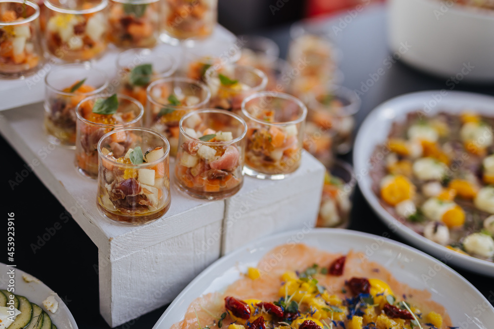 Fototapeta premium Delicious appetizers and food at a party
