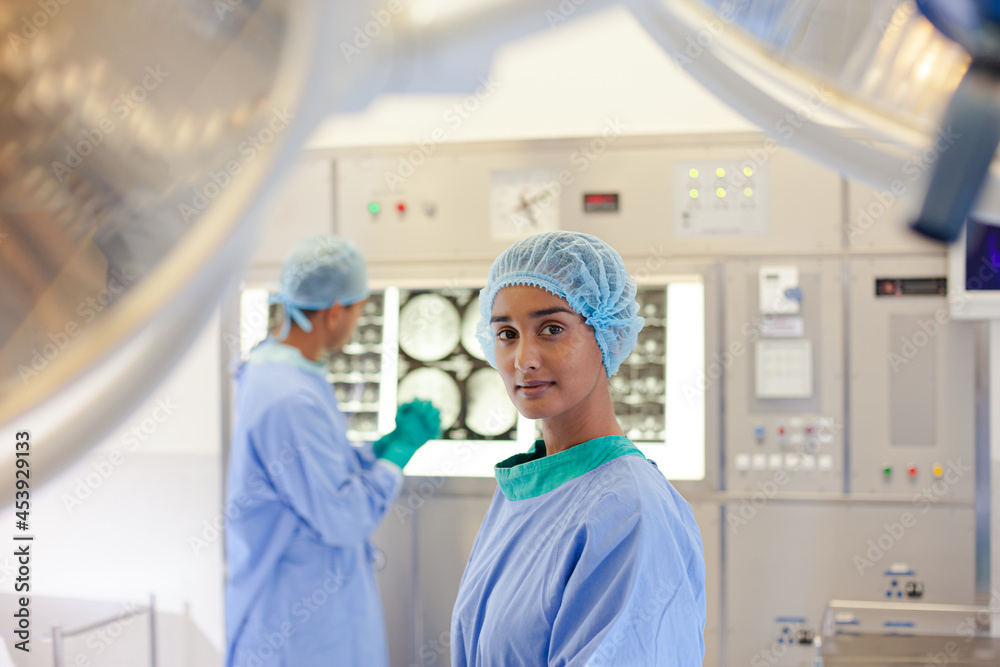 Surgeon standing in operating room Surgeon standing in operating room