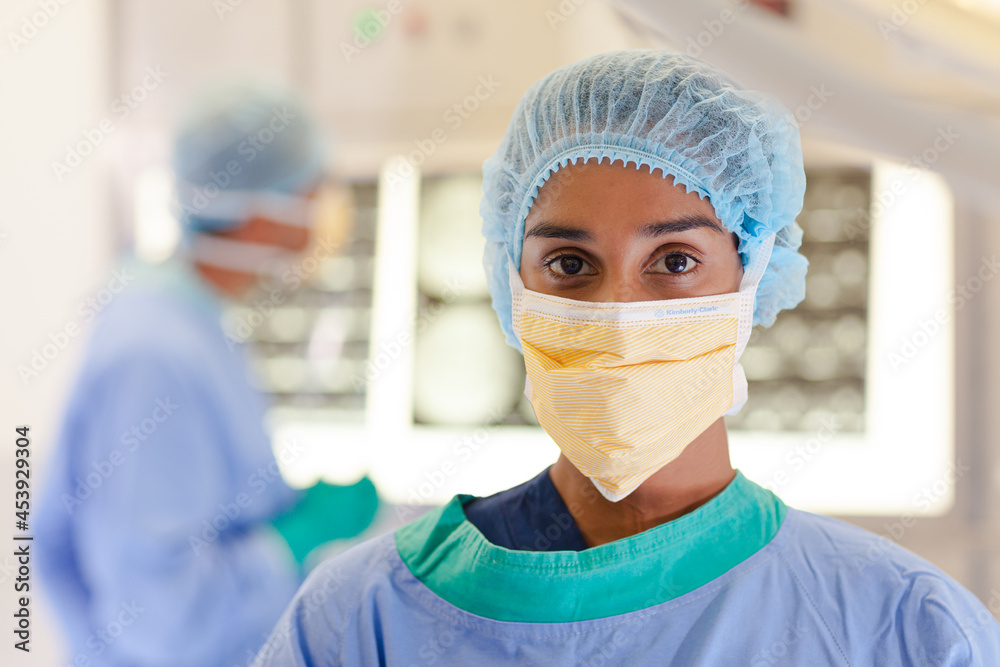 Surgeon standing in operating room Surgeon standing in operating room
