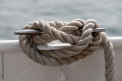 Cleat, hook with ship rope, close up.