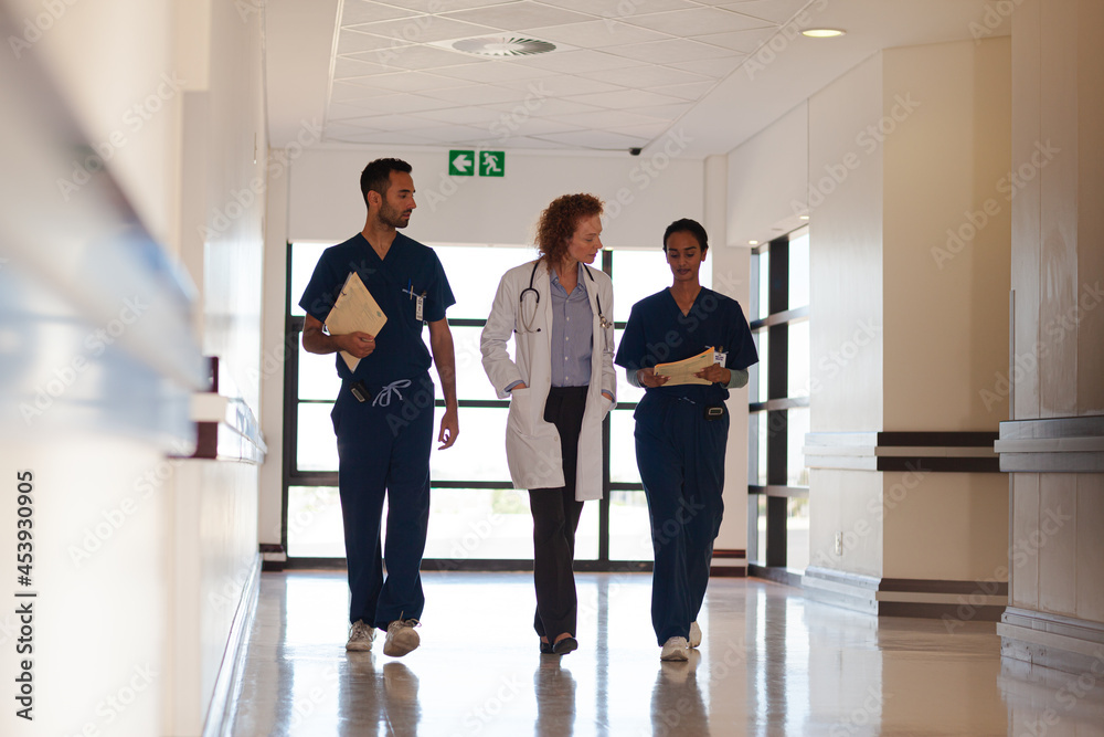 Hospital staff walking in hallway