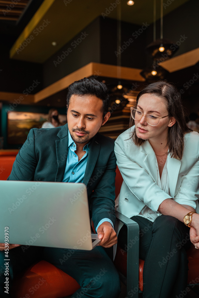 business people working together on the computer